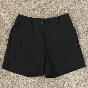 Women's Nike golf shorts in black. Size 2
